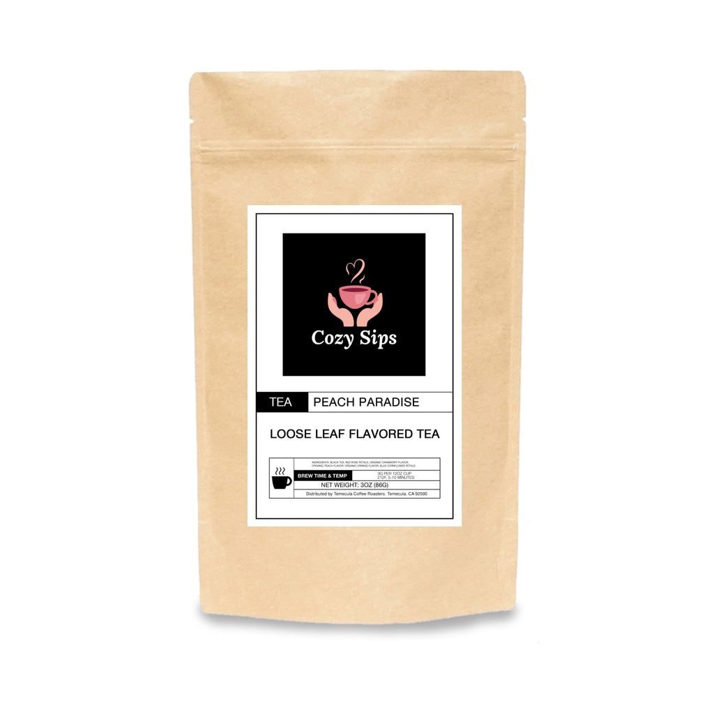 Peach Paradise herbal tea bag on a wooden counter — caffeine-free, fruity herbal blend